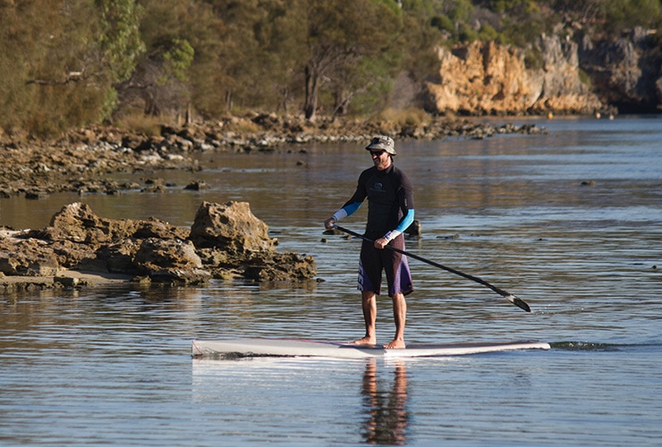 benefits of paddle boarding featured